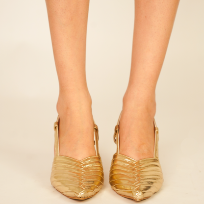 Smooth metallic gold pointed-toe vegan leather pencil heels with beige lining