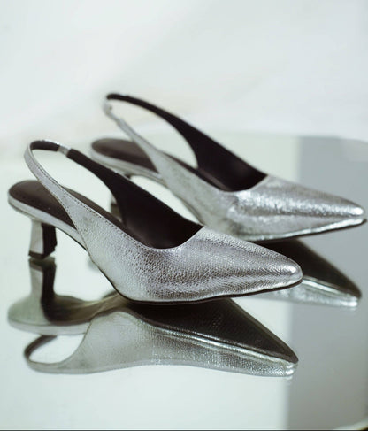 Embossed metallic silver pointed-toe vegan leather kitten heels with black lining