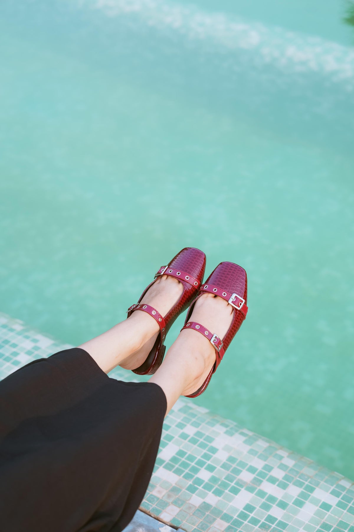 Red croc-textured Mary Jane flats with silver buckle straps